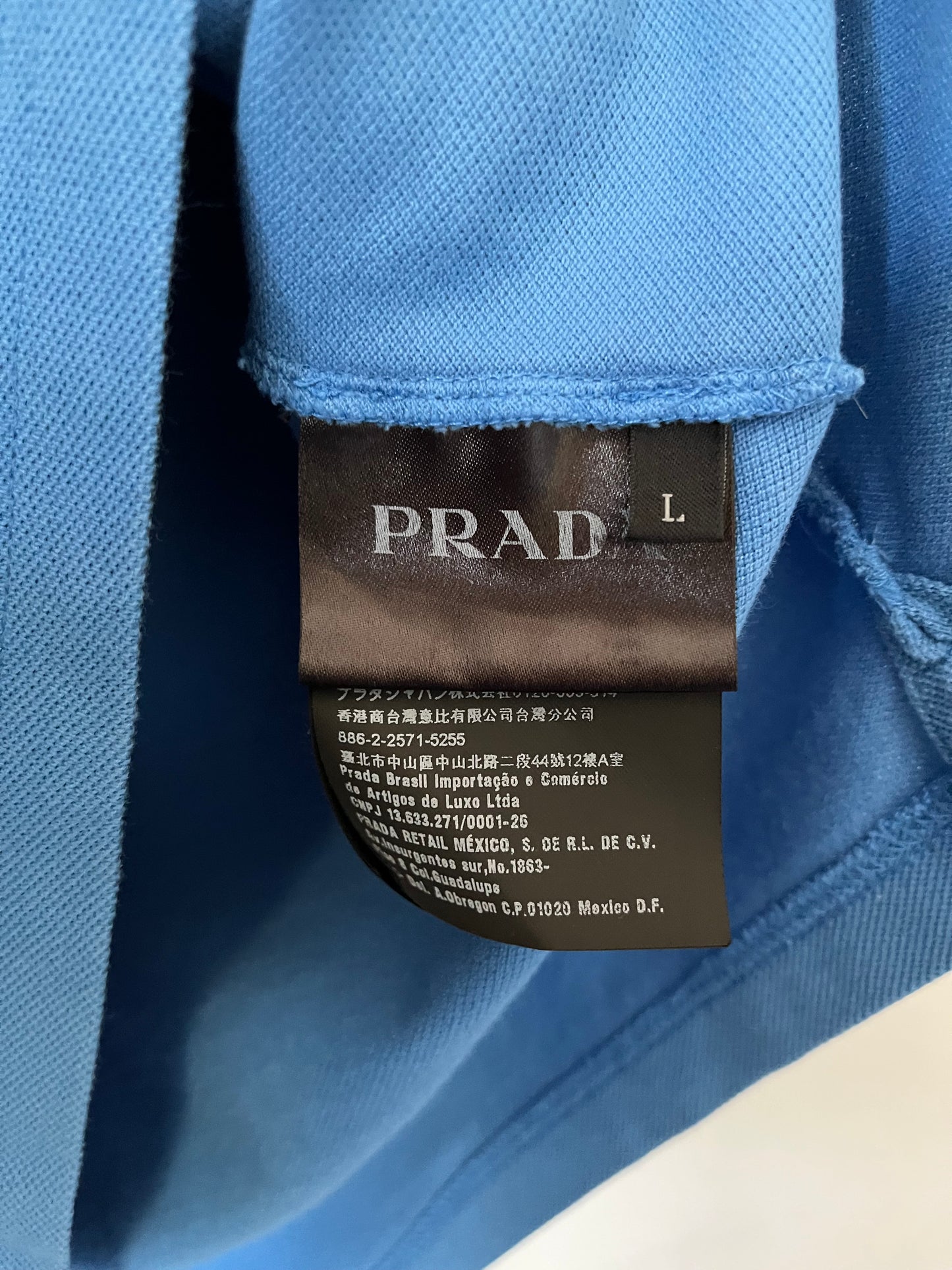 Prada polo shirt size large in light blue